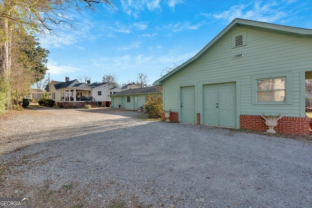 view of property exterior featuring a residential view