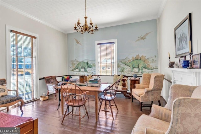 dining space with hardwood / wood-style flooring, a chandelier, and crown molding