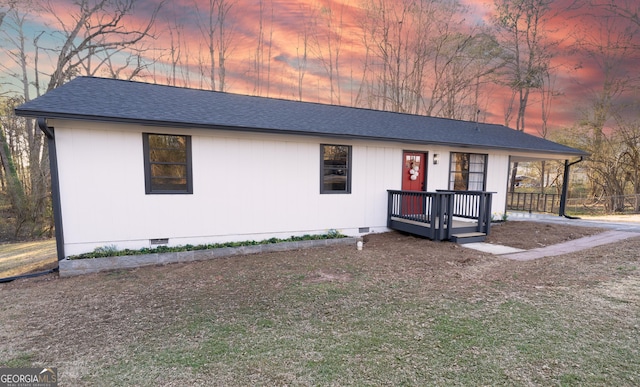 view of front of house with a shingled roof, crawl space, and a porch