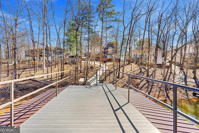 wooden terrace with a residential view