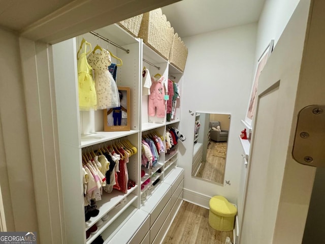 mudroom with wood finished floors