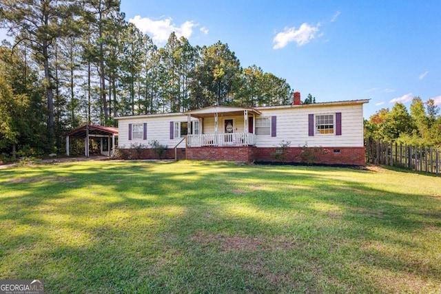 view of front of property with covered porch, a front lawn, crawl space, and fence