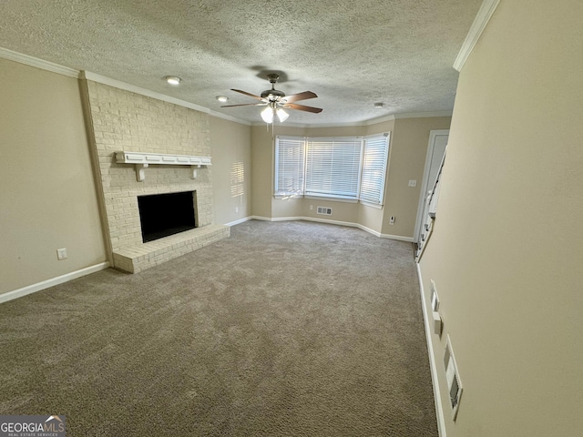 unfurnished living room featuring baseboards, visible vents, ornamental molding, carpet, and a fireplace