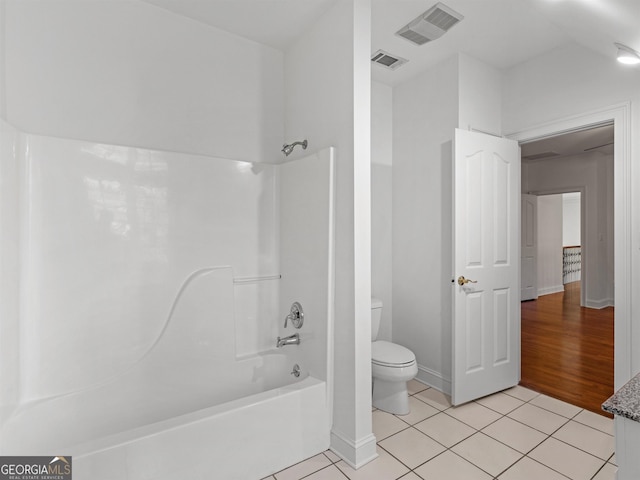 full bath featuring toilet, shower / bathtub combination, visible vents, and tile patterned floors