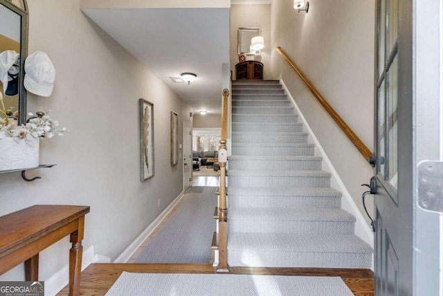 staircase with baseboards