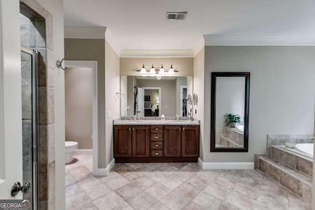 bathroom featuring double vanity, visible vents, a garden tub, crown molding, and a sink