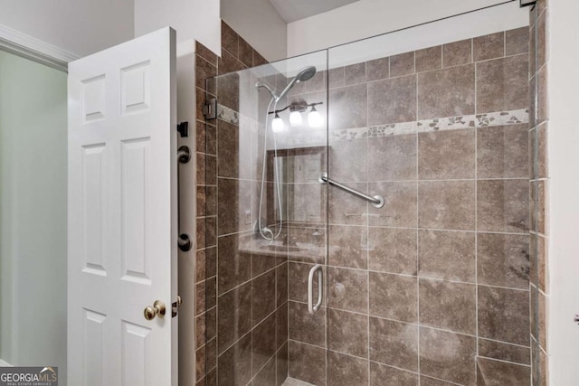 full bath with a shower stall