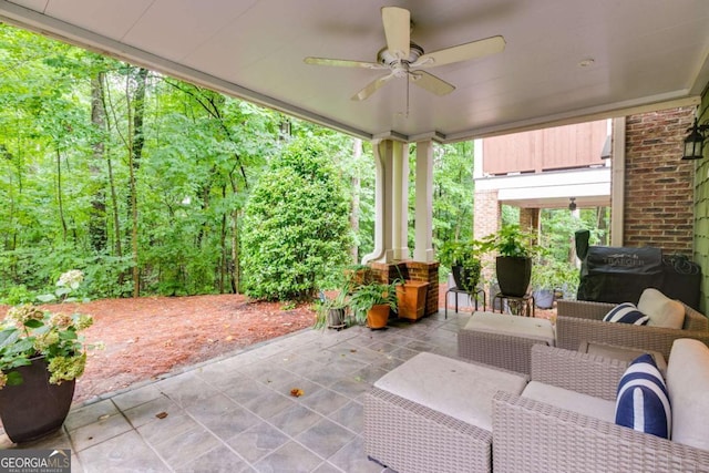 view of patio featuring a ceiling fan