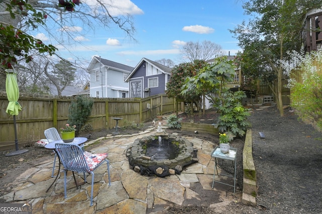 view of patio with a fenced backyard