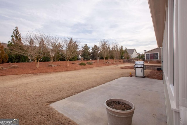 view of patio with a grill