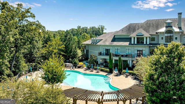 pool with a patio