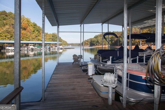 view of dock with a water view