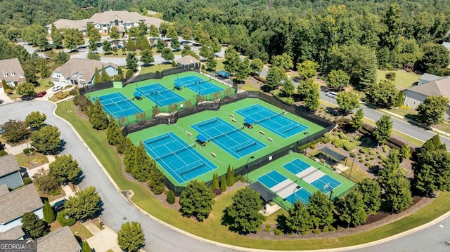 birds eye view of property with a residential view