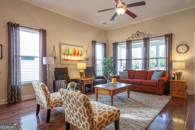 living room with baseboards, dark wood finished floors, and crown molding