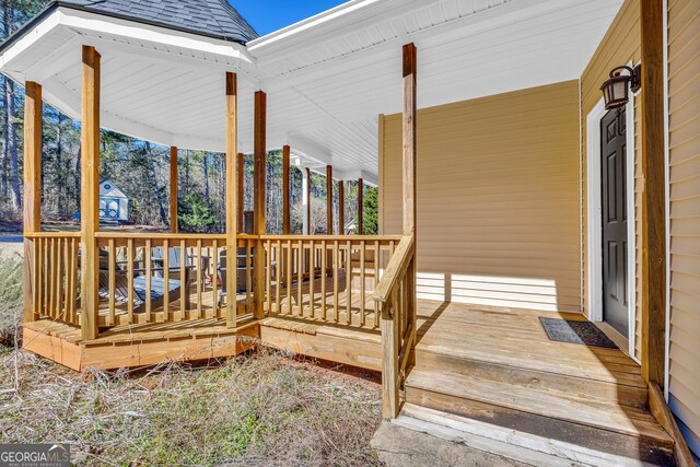 599 Double Branch Rd, Danielsville, GA 30633 - wooden terrace featuring covered porch