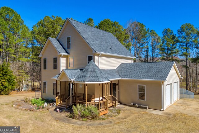 599 Double Branch Rd, Danielsville, GA 30633 - rear view of property with a shingled roof and a porch
