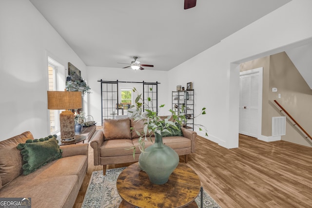 599 Double Branch Rd, Danielsville, GA 30633 - living area featuring a ceiling fan, wood finished floors, and baseboards