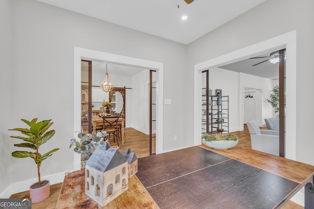 599 Double Branch Rd, Danielsville, GA 30633 - dining area with a ceiling fan, wood finished floors, baseboards, a chandelier, and recessed lighting
