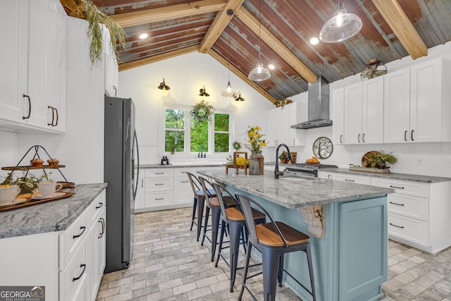 599 Double Branch Rd, Danielsville, GA 30633 - kitchen with wall chimney range hood, stainless steel appliances, a sink, brick patterned flooring, and light stone countertops
