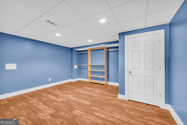 599 Double Branch Rd, Danielsville, GA 30633 - unfurnished bedroom featuring wood finished floors, baseboards, a drop ceiling, and recessed lighting