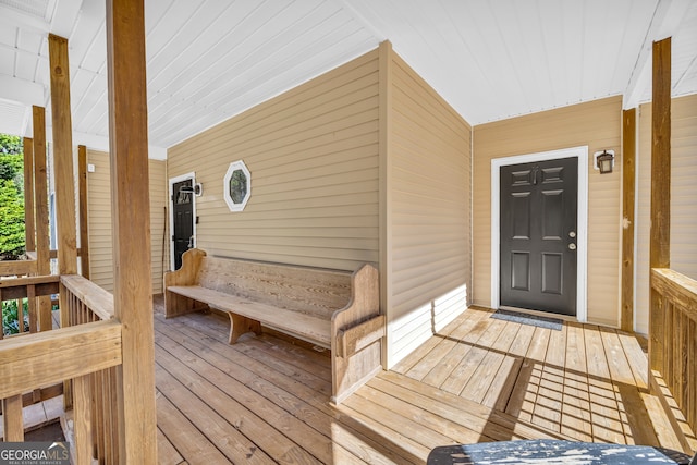 wooden deck featuring a porch