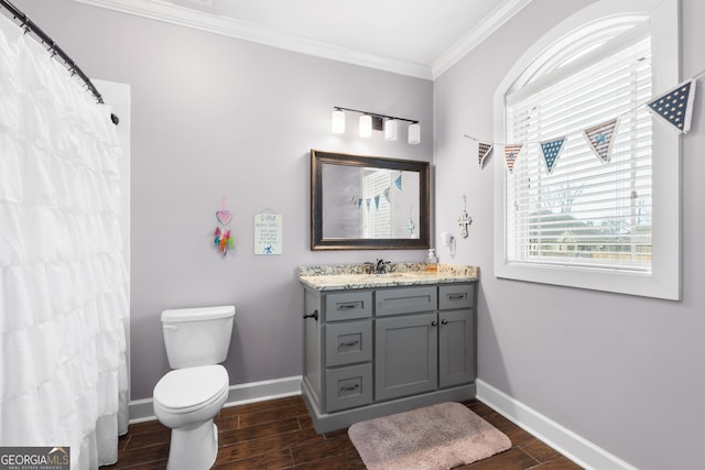 full bathroom with toilet, baseboards, ornamental molding, and wood finished floors