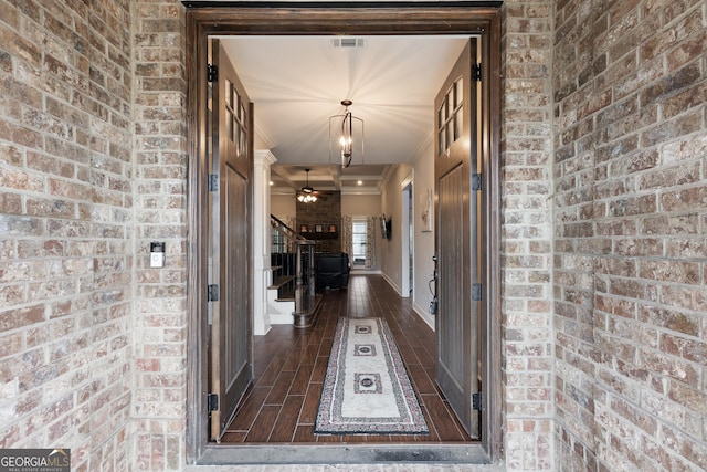 doorway to property featuring visible vents