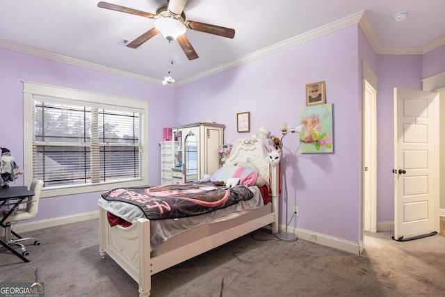 bedroom featuring carpet floors, ornamental molding, and baseboards