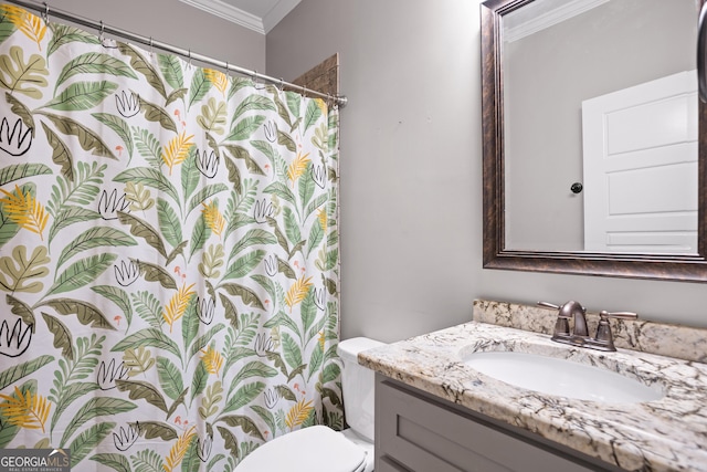 bathroom featuring curtained shower, crown molding, vanity, and toilet