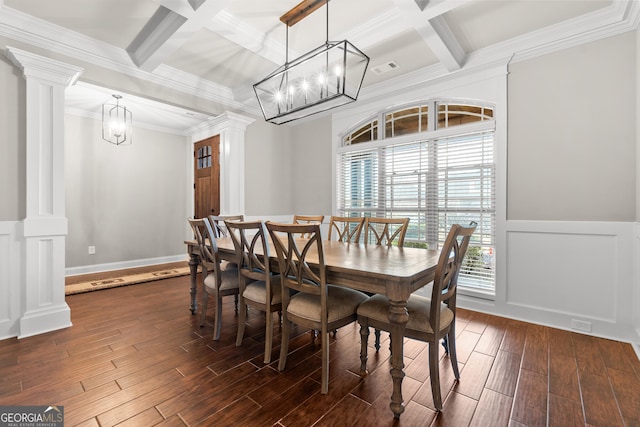 dining room with dark wood-type flooring, coffered ceiling, and ornate columns