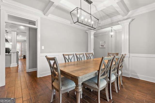 dining area featuring coffered ceiling, beamed ceiling, ornate columns, and wood finished floors