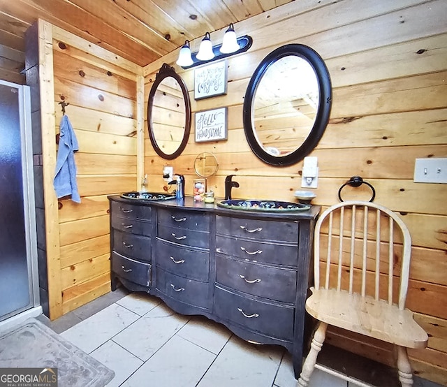 full bath featuring double vanity, wooden ceiling, a shower stall, and wooden walls