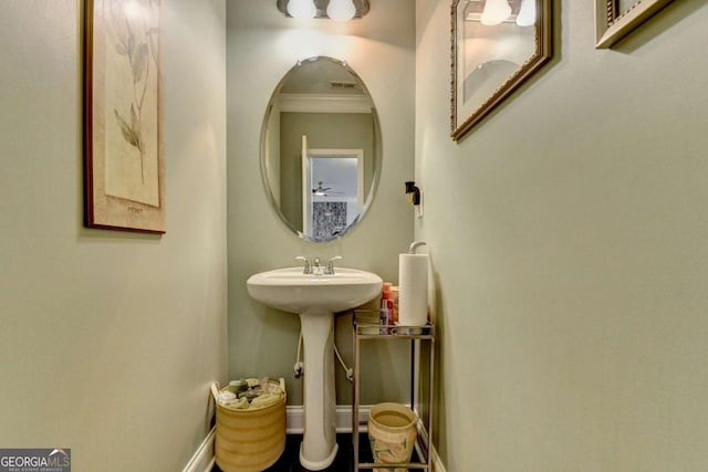 bathroom featuring baseboards