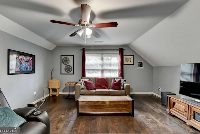 living area with lofted ceiling, visible vents, a ceiling fan, wood finished floors, and baseboards