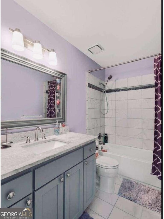 full bath with toilet, visible vents, vanity, tile patterned floors, and shower / bath combination with curtain