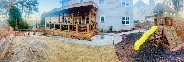 view of jungle gym with a deck