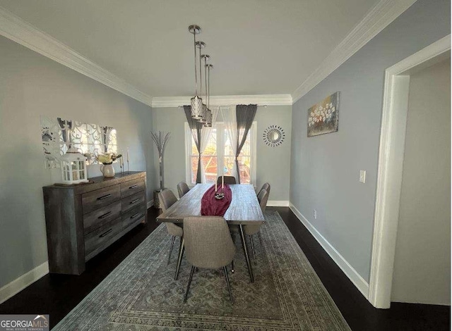 dining area featuring ornamental molding, baseboards, and dark wood-style floors