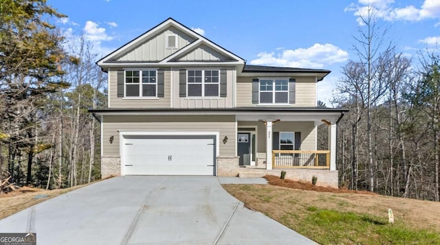 craftsman-style home with a porch, a garage, brick siding, concrete driveway, and board and batten siding