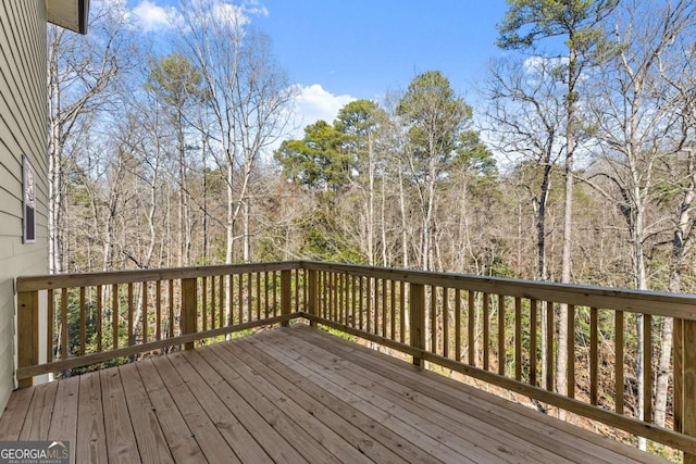 deck with a wooded view