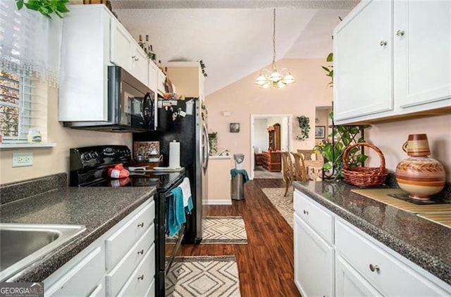 kitchen featuring black appliances, white cabinets, and dark wood finished floors