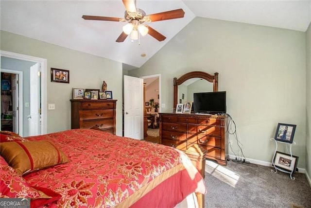 bedroom featuring a ceiling fan, carpet, vaulted ceiling, and baseboards