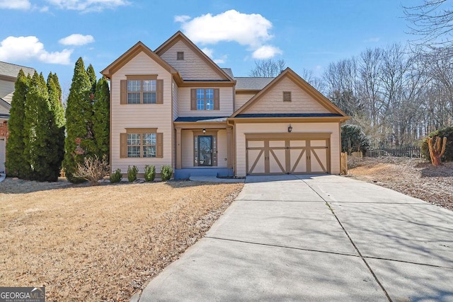 craftsman house featuring a garage and driveway