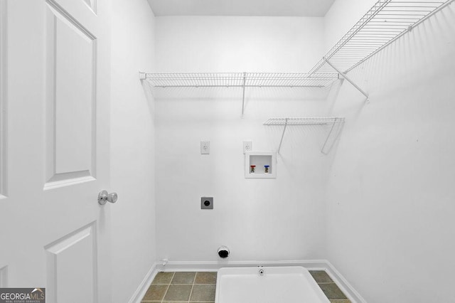 clothes washing area with laundry area, hookup for a washing machine, baseboards, and hookup for an electric dryer