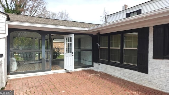 8875 E Broad St, Sparta, GA 31087 - view of patio / terrace featuring a sunroom
