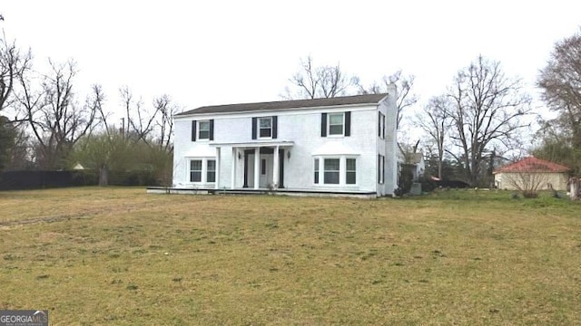 8875 E Broad St, Sparta, GA 31087 - view of front of house with a front lawn