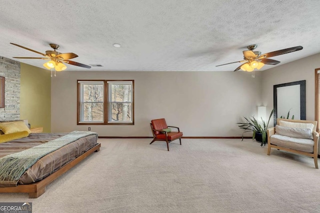 carpeted bedroom with baseboards, visible vents, and a textured ceiling