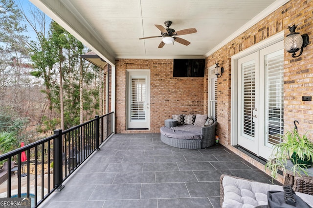 8760 Colonial Pl, Duluth, GA 30097 - balcony featuring french doors and a ceiling fan