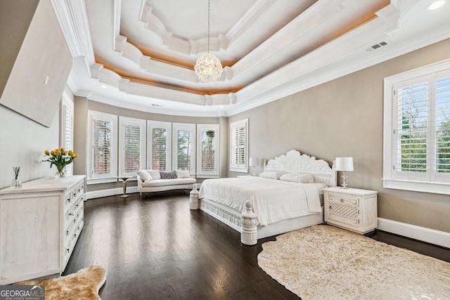 bedroom featuring visible vents, baseboards, dark wood-style floors, a tray ceiling, and crown molding