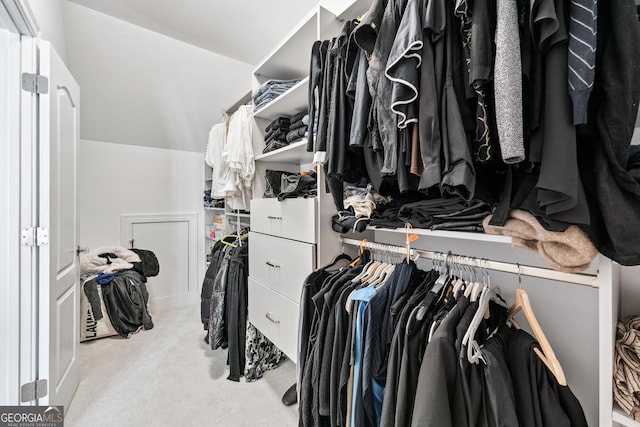 8760 Colonial Pl, Duluth, GA 30097 - walk in closet with carpet floors