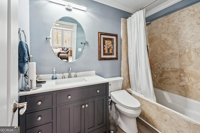 full bathroom featuring crown molding, toilet, shower / bath combo, vanity, and wood finished floors